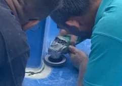 Clearwater pool shop experts fixing a crack in fibreglass pool